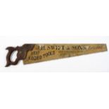 Advertising : A large wooden sign in the form of a saw, inscribed, J H Swift & Sons,