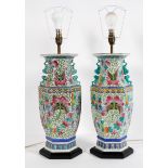 A pair of Chinese Famille rose lamps, 20th century, of hexagonal baluster form,