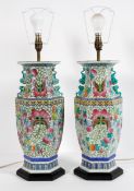 A pair of Chinese Famille rose lamps, 20th century, of hexagonal baluster form,