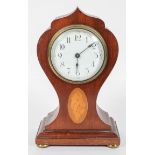 An Edwardian mahogany and inlaid mantel clock,