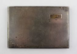 A George V silver cigarette case of rectangular form,
