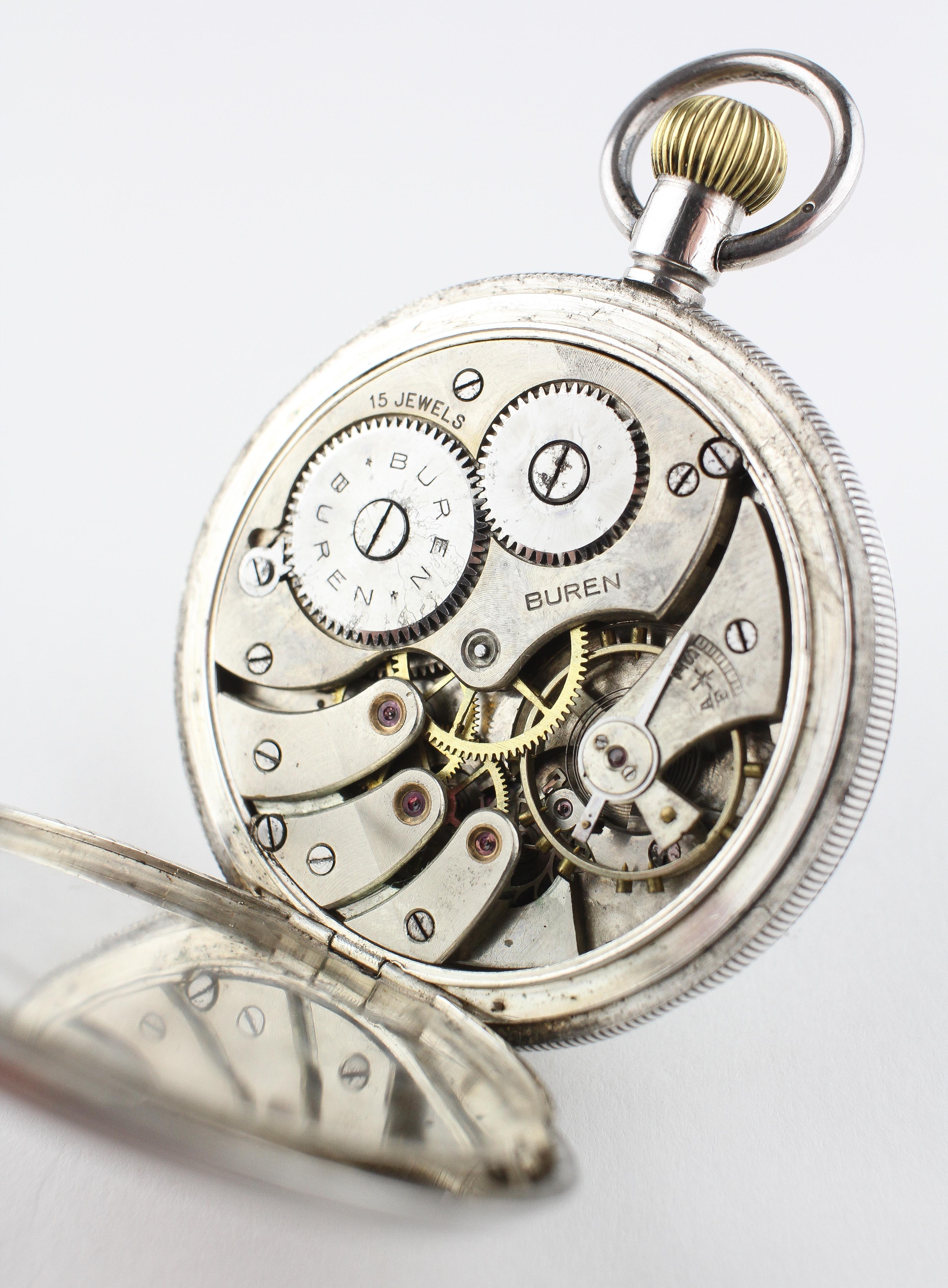 An open face pocket watch. Circular white dial with roman numerals. - Image 2 of 3