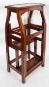A set of mahogany and leather insert metamorphic library steps,