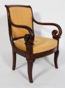 A Regency mahogany carver or elbow chair, the scrolled top rail, scrolling arms,