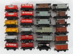 A collection of Hornby Dublo wagons, including Mobil, Shell, Esso, Vacuum and Royal Daylight Tanks,