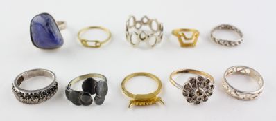 A collection of ten rings of variable designs. All are marked 925 for silver.