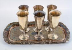 An EPNS tray and six champagne flutes