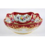 A French porcelain fruit bowl, 19th century, in the Sevres style, of square form,