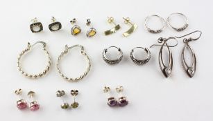 A collection of ten pairs of earrings of variable designs. Most are marked 925 for silver.