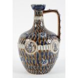 A Doulton Lambeth stoneware ewer, late 19th century, with scale or pine cone decoration,