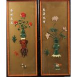 A pair of Chinese hard stone flower pictures, 20th century, each with a four character inscription,