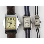 A collection of three wristwatches to include: A hallmarked sterling silver cased cocktail watch