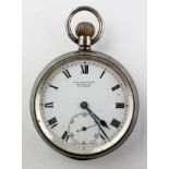 An open face pocket watch.