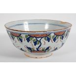 An English Delft fruit bowl, late 18th century, polychrome painted with foliage in blue,