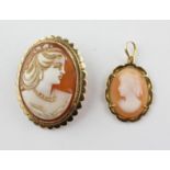 A yellow metal oval carved cameo brooch set within a fancy edge mount.