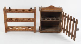 An egg rack, with pierced Gothic decoration and another with a lathe door,