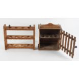 An egg rack, with pierced Gothic decoration and another with a lathe door,