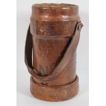 A leather bomb carrier, of cylindrical form, stamped No 58 III SEN & Co Ltd,
