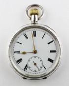 An open face pocket watch. Circular white dial with roman numerals.