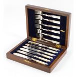 A cased set of mother of pearl handled silver plated fish cutlery,