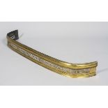 A Victorian brass fire fender, late 19th century,