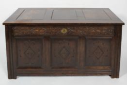 A Victorian oak coffer, late 19th century, of panelled construction,