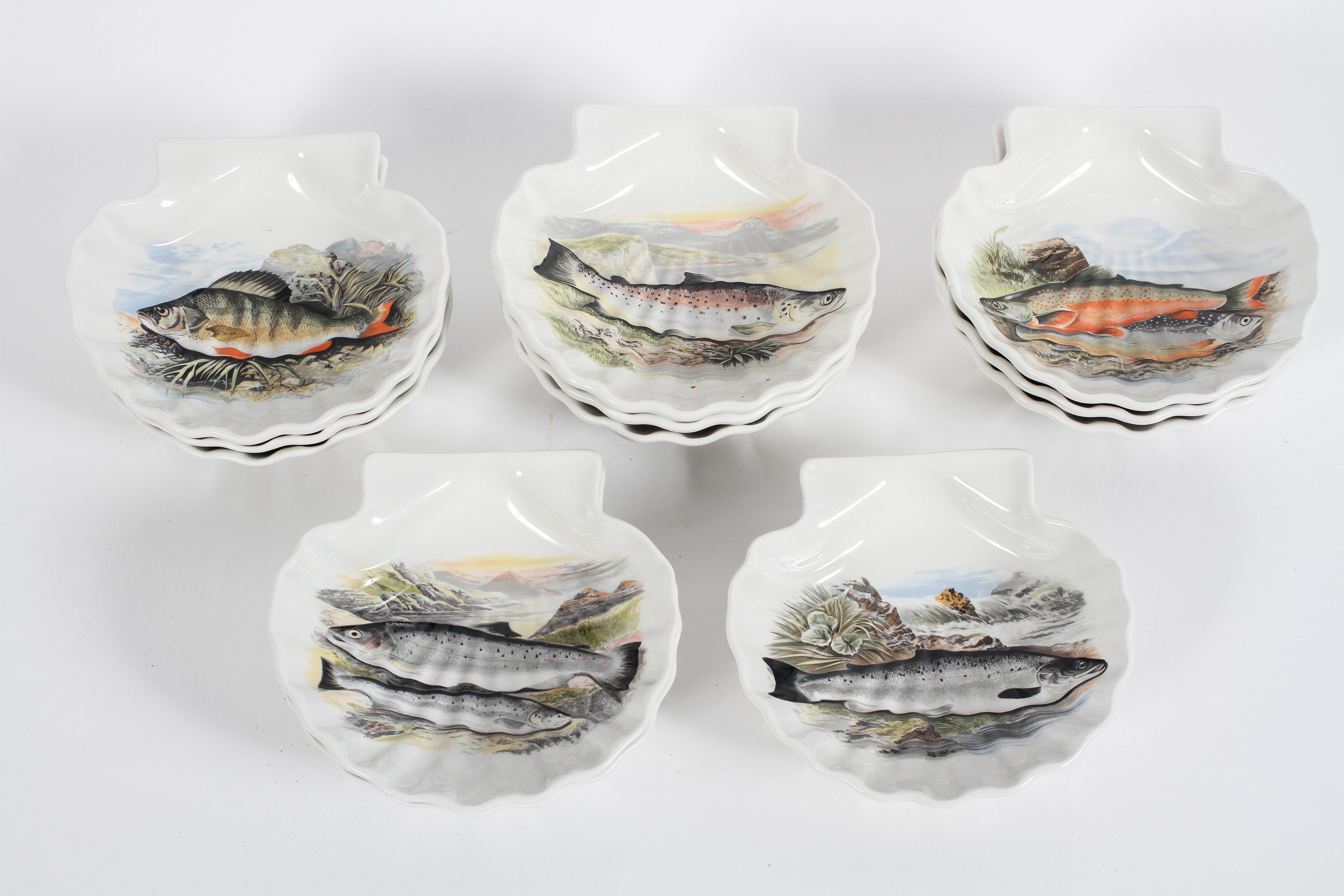 A set of twelve Portmeirion scallop dishes, from the 'Compleat Angler' British Fishes series,