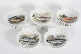 A set of twelve Portmeirion scallop dishes, from the 'Compleat Angler' British Fishes series,