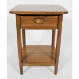 An Ercol Windsor Lamp Table, in Golden Dawn, a single drawer above a shelf, raised on round legs,