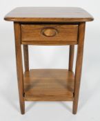 An Ercol Windsor Lamp Table, in Golden Dawn, a single drawer above a shelf, raised on round legs,