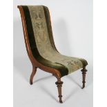 A Victorian beech framed nursing chair with tapestry and velour upholstery,