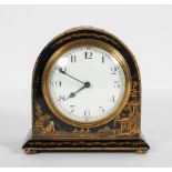 A Georgian style Japanned mantel clock, the enamelled dial on a French brass movement,