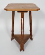 A Liberty style oak occasional table,