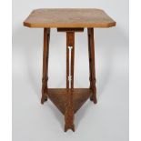 A Liberty style oak occasional table,