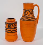 Two 1960's West German pottery vintage vases, both in an orange and fat lava glaze,