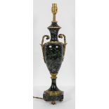 A Neo classical green marble and gilt metal mounted lamp stand, of two handled amphora form,