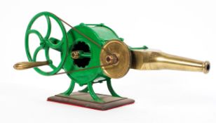 A set of mechanical bellows, the green painted body with brass handle and spout,