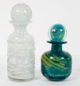 Two Mdina late 20th century glass bottles with stoppers,