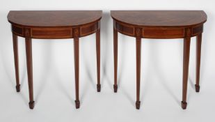 A pair of Georgian style mahogany and inlaid pier tables, the bow fronted top with cross banding,