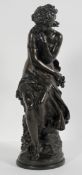 After Moreau, A scantily clad maiden sat on a rocky outcrop, signature, bronzed resin,