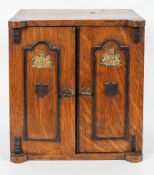 A novelty oak Smoker's cabinet, in the form of a safe,