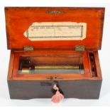 A small Swiss music box, with a single cylinder playing four airs, the case with line inlay,