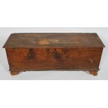 An elm coffer, late 17th century, with candle box interior and notched decoration,