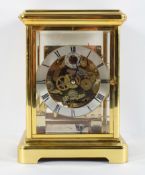 A Kieninger brass mantel clock, the brushed steel chapter ring with subsidiary seconds dial,