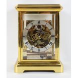 A Kieninger brass mantel clock, the brushed steel chapter ring with subsidiary seconds dial,