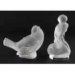A Lalique glass figure of a maiden kneeling by a goose,