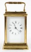 A 19th century French brass cased repeating carriage clock with eight day movement,