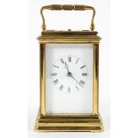 A 19th century French brass cased repeating carriage clock with eight day movement,