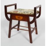 A mahogany piano stool with inlaid Art Nouveau style decoration,