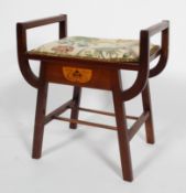 A mahogany piano stool with inlaid Art Nouveau style decoration,